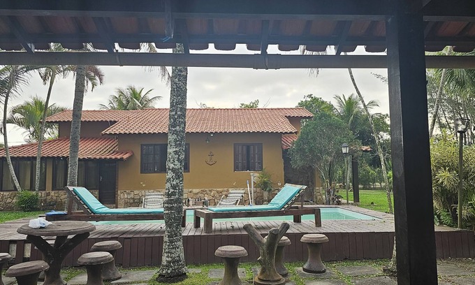 Unamar Condo | Discover Casarao Unamar: Poolside Retreat with Family Comfort
