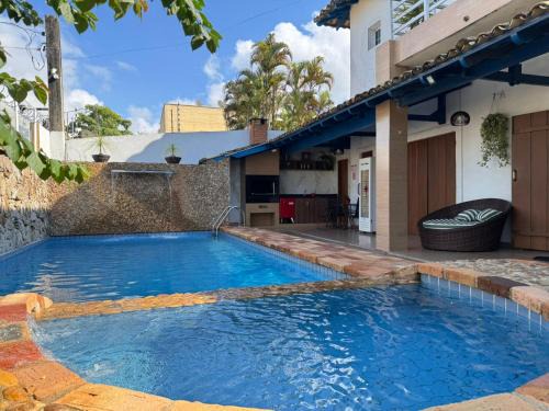 Jardim Virginia House | Elegant Casatortuga Guaruja: Pet-Friendly with Pool Access