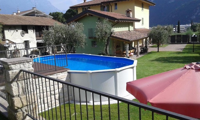 Riva del Garda Apartment | Discover CasaVarone: Oceanfront Retreat with Pool Access