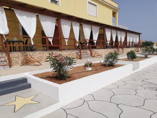 Lampedusa Apartment | Stunning Oceanfront Retreat at I Quattroventi – Rated 9.7