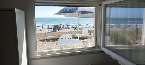 Torvaianica Apartment | Beachfront Casina sulla Sabbia with Private Ocean Views