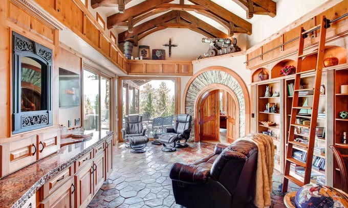 Woodland Park House | Idyllic Castle with Pikes Peak Views & Relaxing Hot Tub