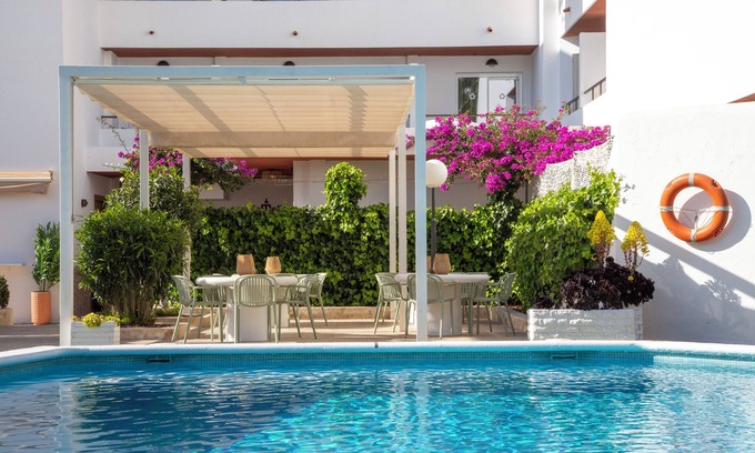 San Antonio Bay Hotel | Experience Hotel Bahia Playa: Rated 9.4 with Pool & Spa