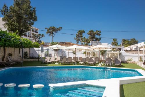 San Antonio Bay Hotel | Relax at Hotel Bahia Playa with Pool & Ocean Views