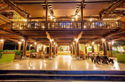 Quan Tom Hotel | Explore Cat Tien Jungle Lodge: Relax by the Oceanfront Pool