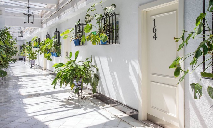 Santa Aurelia-Cantabrico-Atlantico-La Romeria Hotel | Discover Catalonia Híspalis: Pool, Spa & Family-Friendly