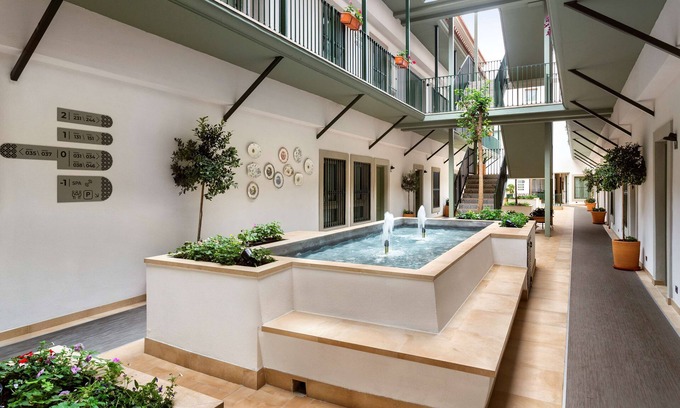 Fontanal-Maria Auxiliadora-Carretera de Carmona Hotel | Relax at Catalonia Santa Justa: 4-Star Comfort Awaits