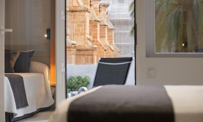 Almeria Centro Hotel | Elegant Catedral Almería: Poolside with Ocean Views