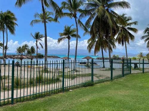 Bas du Fort Apartment | Idyllic Cauris Lodge du Marisol: Oceanfront with Beach Access