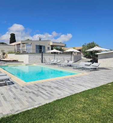 Brucoli Villa | Top-Rated Cava Del Sol: Oceanfront Bliss with Pool Access