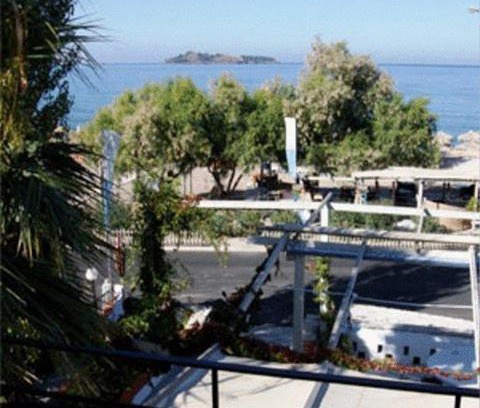 Petra Hotel | Pet-Friendly Cavo Christo: Oceanfront Retreat with Pool