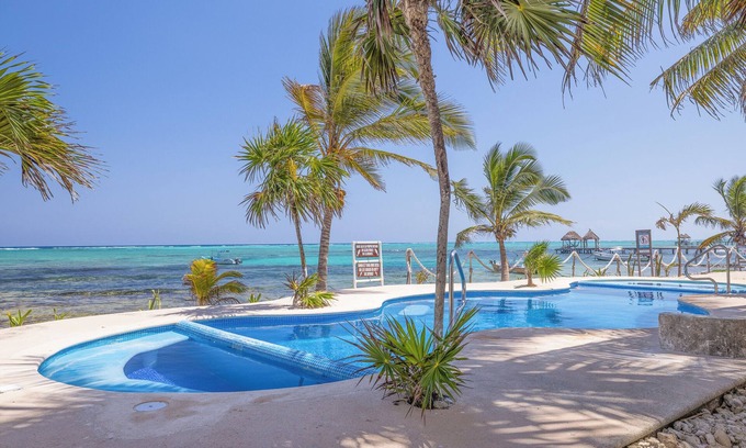 Ek Balam Village House | Oceanfront Queen Room with Pool & Spa Amenities