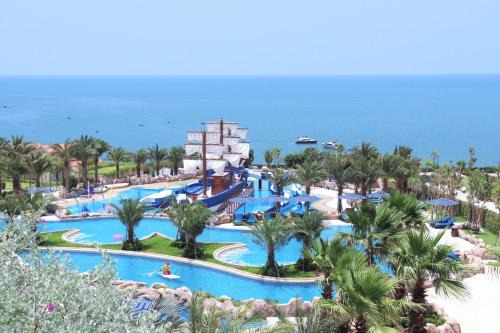 East Ham Tien Beach Resort | Experience Centara Mirage Resort Mui Ne: Oceanfront Relaxation