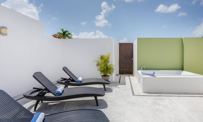 Zazil-ha Condo | Cozy 2BR Retreat Steps from Beach with Rooftop Pool