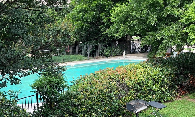 North University Apartment | Central Austin Apartment with Pool + Balcony. Pet-friendly! Family friendly!