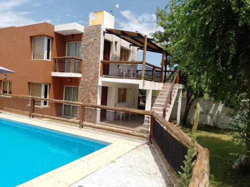Potrero de los Funes Apartment | Experience Comfort at Cerro Encanto with Pool & Hot Tub