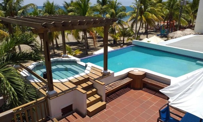 Barrio El Centro Hotel | Experience Comfort at Cesar Mariscos with Pool & Spa