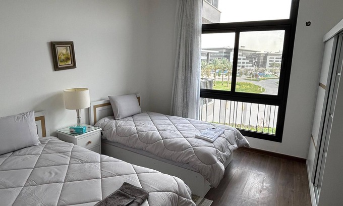 New Cairo Apartment | Modern 2BR Retreat Steps from CFC Mall