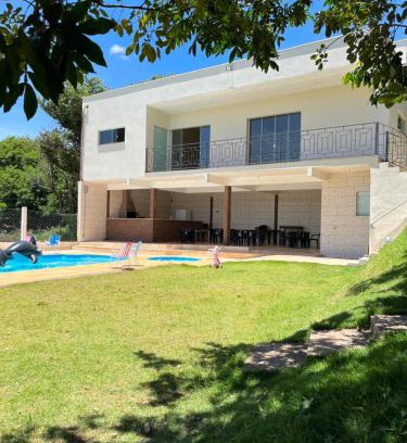 Serra Negra House | Discover Chácara do André: Family-Friendly Retreat with Pool