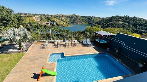 Igarata House | Relax at Chácara Gama: Jacuzzi, Pool & Oceanfront Views