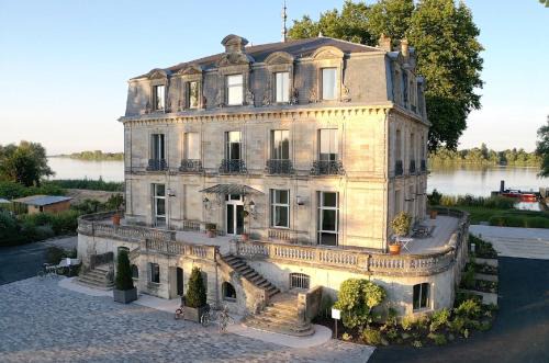 Blanquefort Hotel | Elegant Stay at Château Grattequina with Ocean Views
