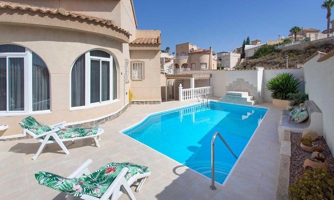 Rojales House | Idyllic CH Villa Plara: Oceanfront Retreat Near Golf