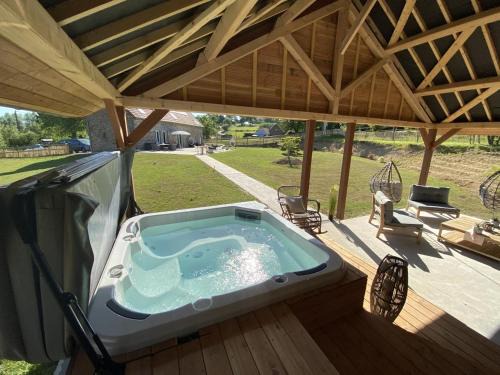 La Chaise-Baudouin Villa | Relaxation Awaits at Chaignonnières Roulotte with Hot Tub