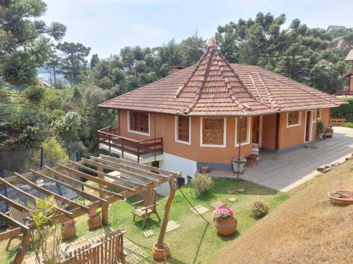 Campos do Jordao House | Experience Chalé Belga with Pool & Hot Tub near Capivari