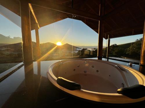 Sapucai-Mirim Ski Chalet | Relax at Chalés Alto dos Pires: Rated 9.7 with Hot Tub