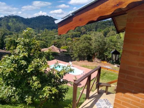 Santo Antonio do Pinhal Cabin | Da Terra Brasil: Relax with Pool & Hot Tub Amenities
