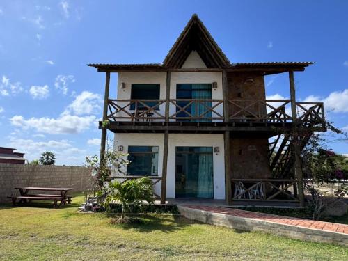 Ponta do Anel Apartment | Chalés Alegria e Estrela: Comfort Steps from the Beach