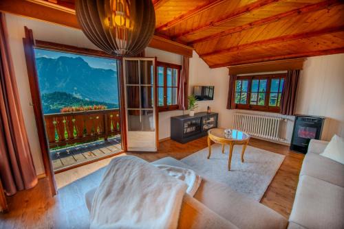 Leysin Apartment | Serpolet Chalet: Oceanfront Retreat with Sauna & High Ratings