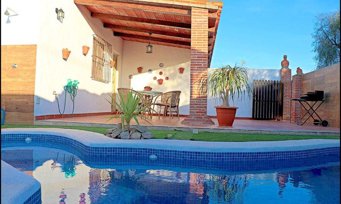 Conil de la Frontera Ski Chalet | Cozy Chalet Retreat with Pool and Perfect 10 Rating