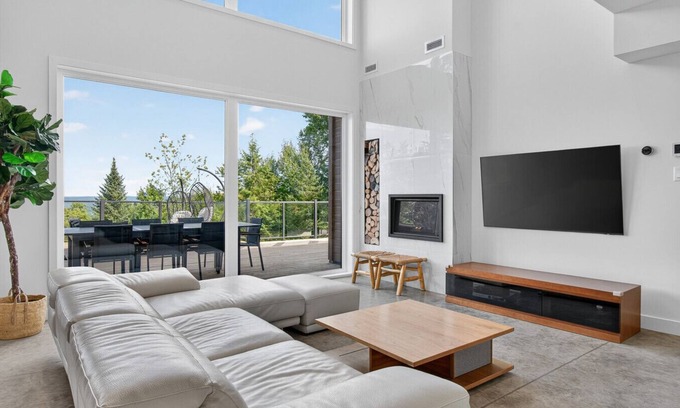 La Conception House | Relax at 220 Rue Du Mont-Assiniboine with Pool & Spa