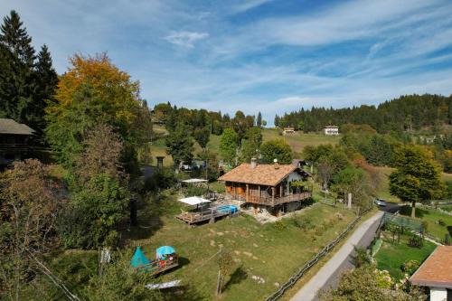 Treviso Bresciano Ski Chalet | Charming Chalet "Baita Cavacca" with Oceanfront Pool