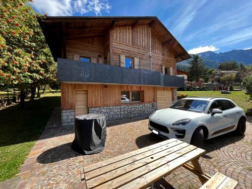 Temu Apartment | Chalet Bel-Air: Steps from the Slopes with Garden Bliss