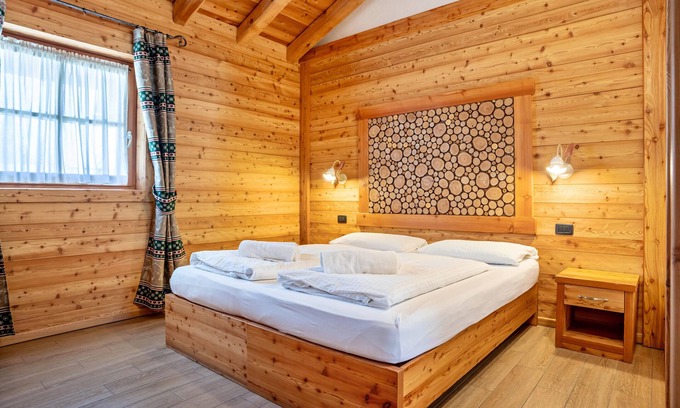 Sant'Antonio di Mavignola Ski Chalet | Chalet 'Camping Faè': Mountain View & Private Terrace Awaits