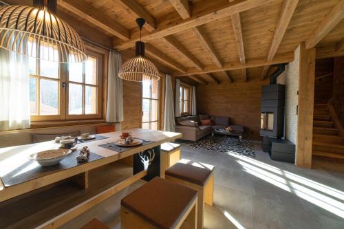 Wildhaus House | Experience Chalet Chäserrugg: 4-Star Comfort with Hot Tub
