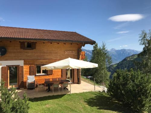 Mayens-de-Riddes Ski Chalet | Relax at Chalet Clochette: 4-Star Retreat with Hot Tub