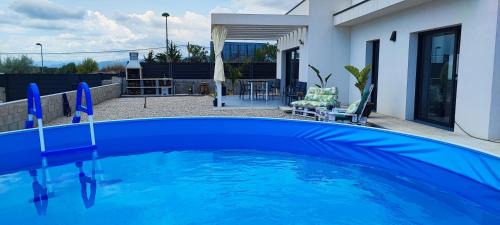 El Catllar House | Relaxing Chalet with Pool, Terrace, and BBQ Area