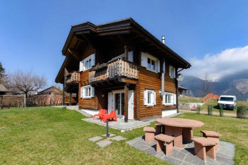 Dalpe Ski Chalet | Discover Chalet Dalpe: Idyllic Retreat Amid Pastures