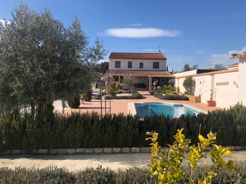 Arenas del Rey House | Pet-Friendly Retreat at Chalet Embalse Bermejales - 9.2/10