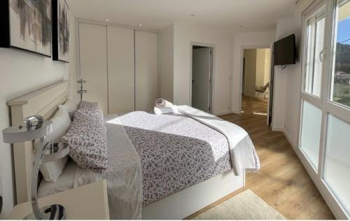 Aldan Apartment | Family-Friendly Chalet en Aldán - Guest Rated 9.8/10