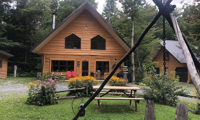 Sainte-Marie Ski Chalet | Wooden Chalet Retreat with Spa & Family-Friendly Amenities