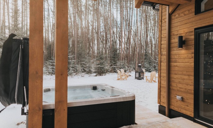 Amherst House | Serene Chalet in the Forest with Spa and Outdoor Fireplace