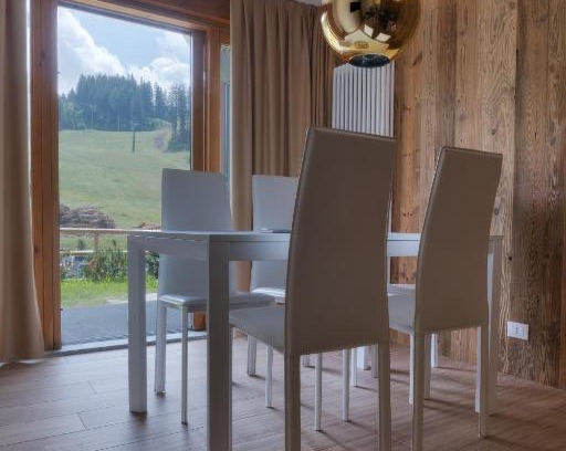 Campo Carlo Magno Apartment | Cozy Chalet Golf Campiglio: Family-Friendly Amenities Await