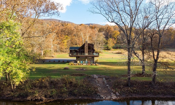 Great Cacapon Ski Chalet | Idyllic Chalet on the Cacapon River with Pool & Spa