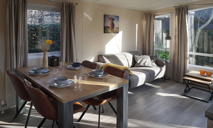Huisduinen Ski Chalet | Oceanfront Chalet Kijkduinlaan - Guest Rated 9.8/10