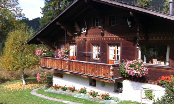 Gstaad Apartment | Inviting Chalet Nyati: Lake Views & Spa Retreat Awaits