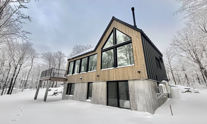 Saint-Etienne-De-Bolto Ski Chalet | Chalet Panoramä-37: Breathtaking Views & Oceanfront Fun